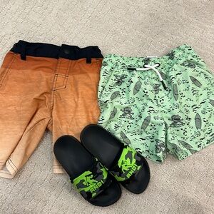 Two board shorts and 1 pair of sandals size 12
